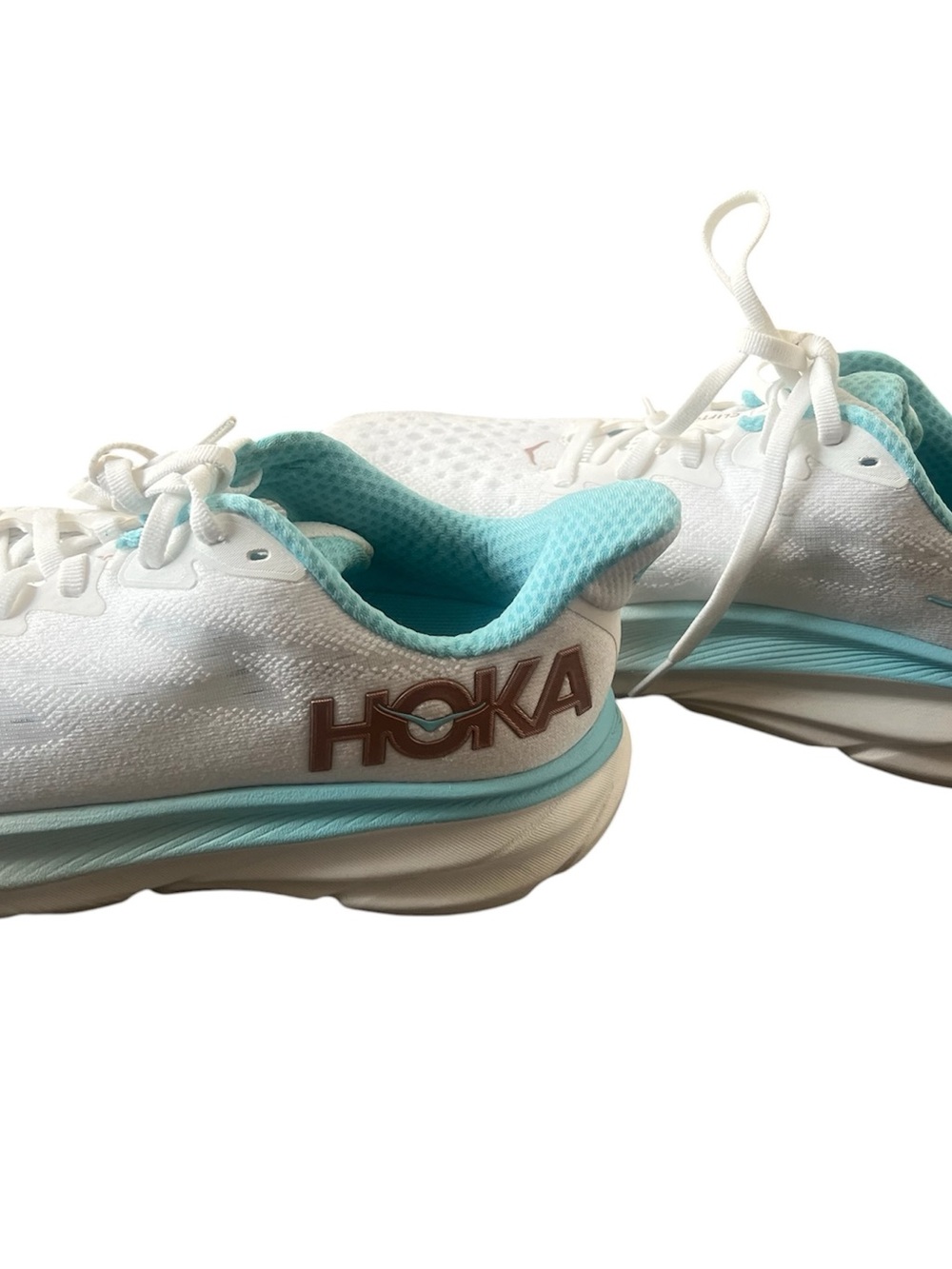 HOKA Women's Clifton 9 in the Frost / Rose Gold colorway, white mesh, sky blue. - Picture 3 of 8